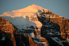 07 First Rays Of Sunrise On Mount Temple Close Up From Lake Louise Village.jpg